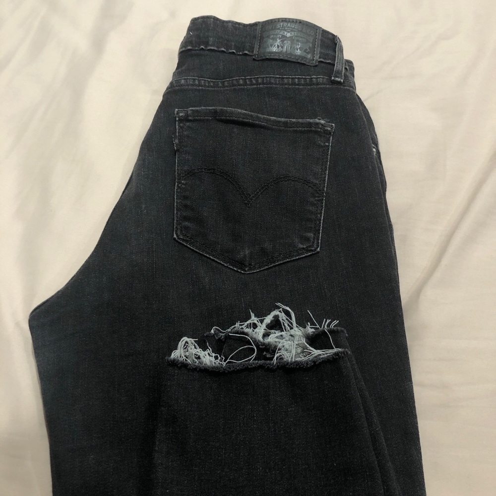 Levi’s ripped jeans.